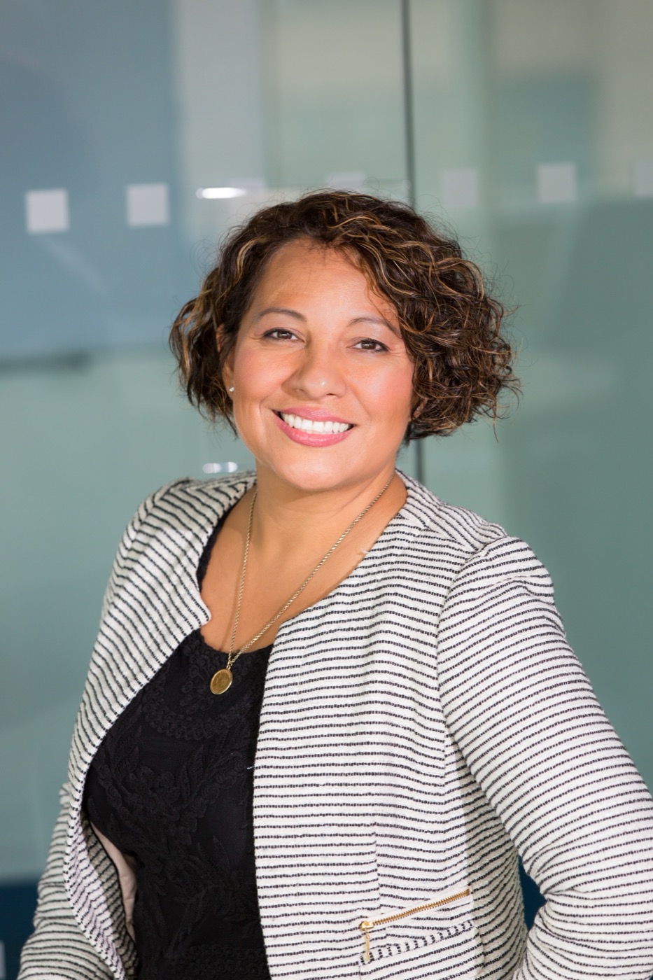 Woman executive smiling in a workplace